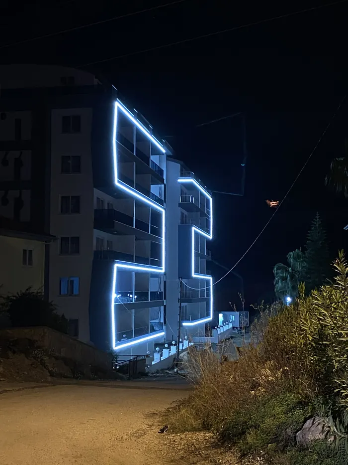 Building outlined in blue LED