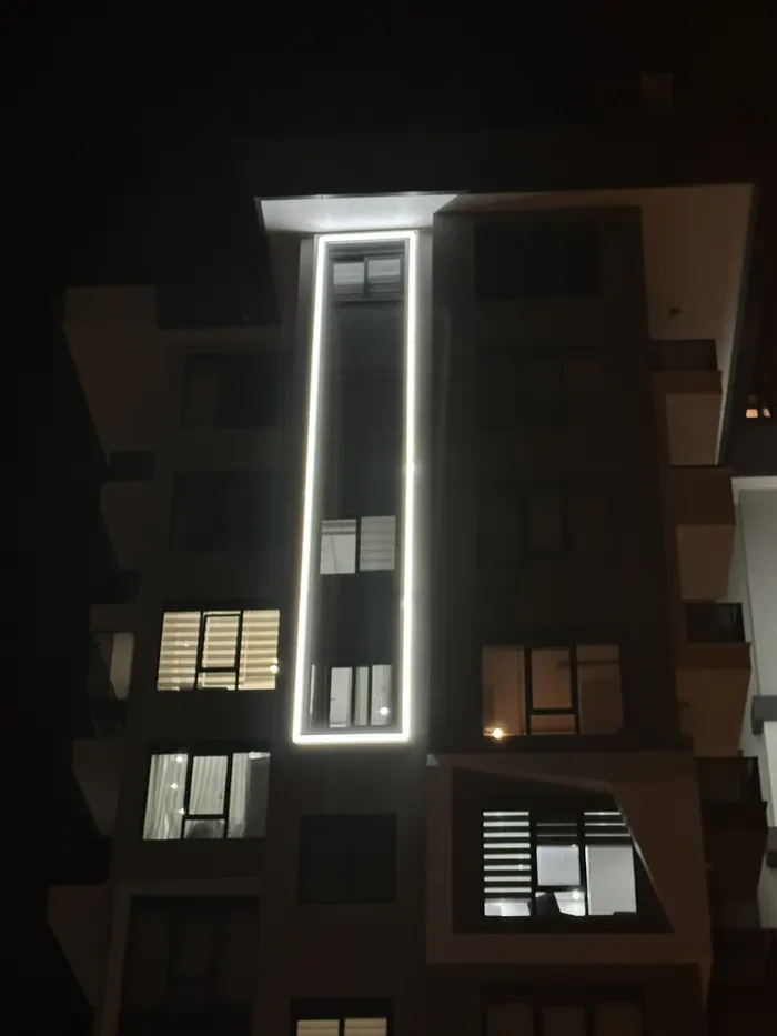 Building with a vertical LED line